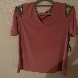 Pink jeweled blouse